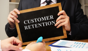customer retention sign on a board